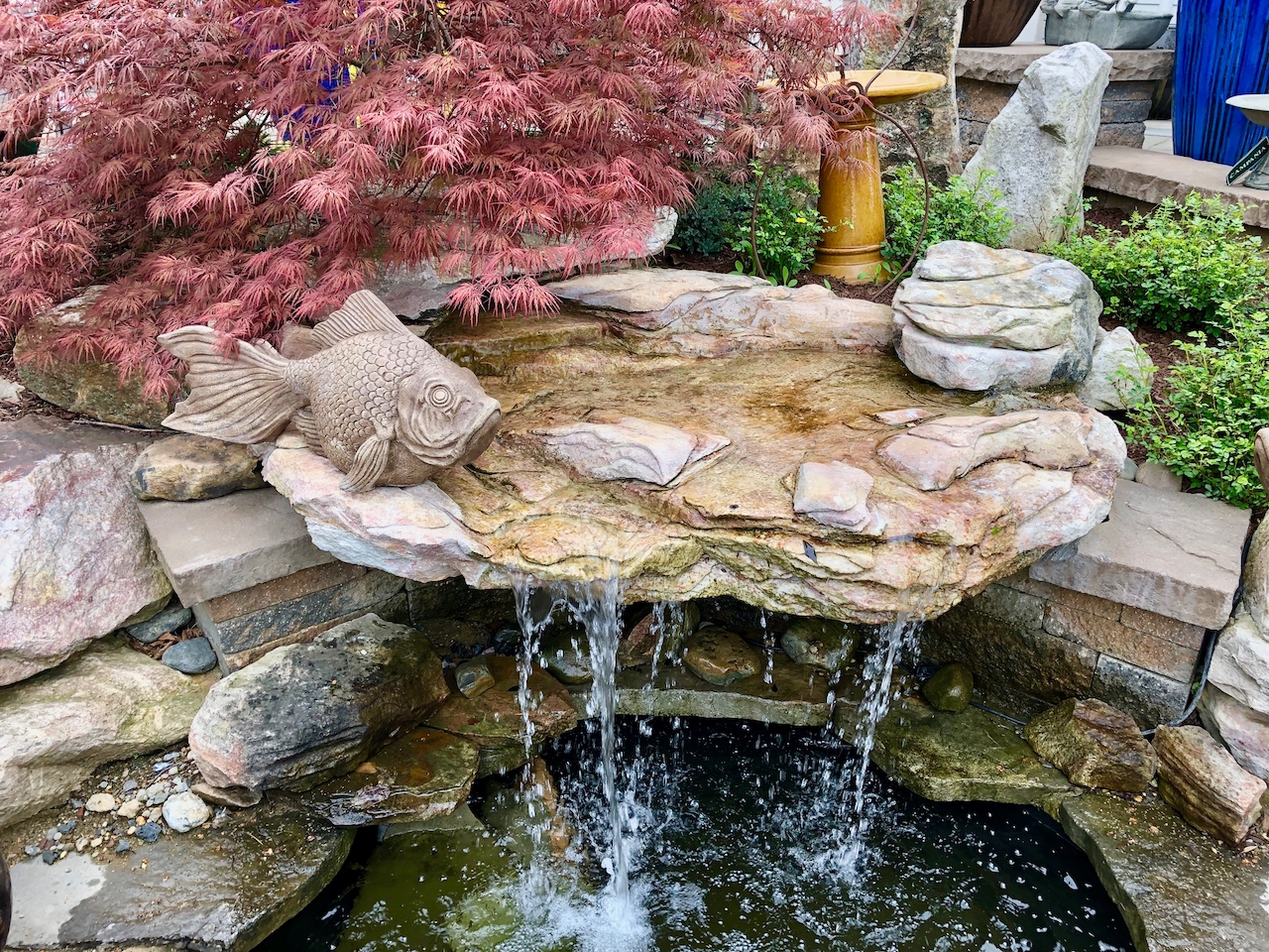 image of water feature which enhances the yard's landscape